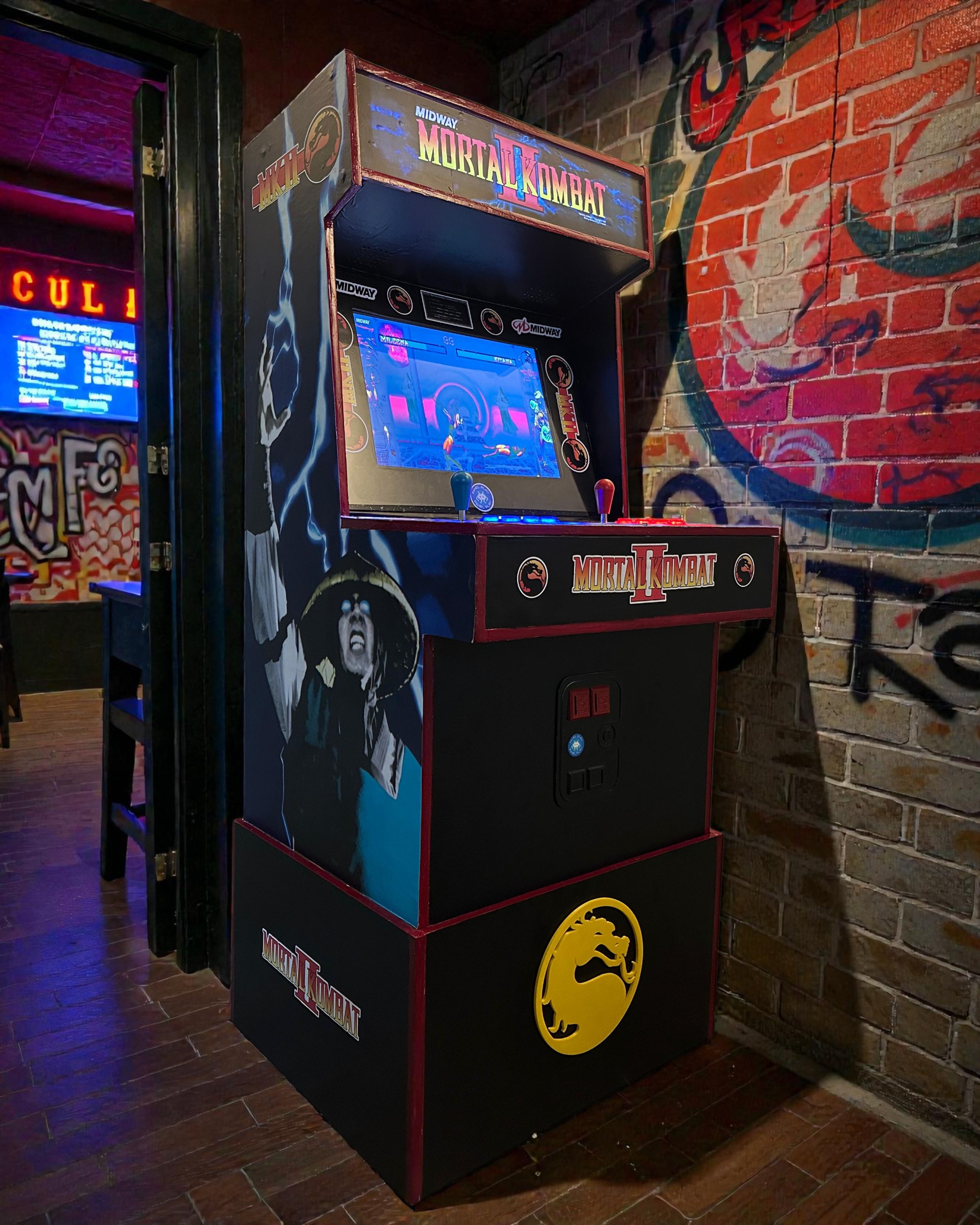Pixel Play Mortal Kombat II arcade cabinet installed at a venue